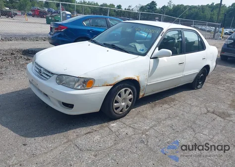 2001 Toyota Corolla Le из США, поврежденный, VIN 2T1BR12E81C451844